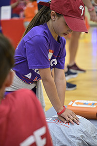 Young girl learns Hands-Only CPR at Chester County Hospital.