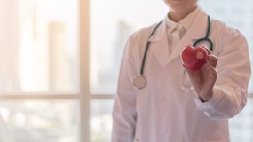 Doctor_with_heart_shaped_stress_ball