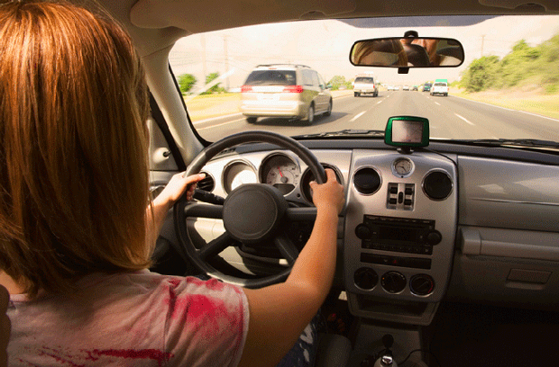 woman driving in car